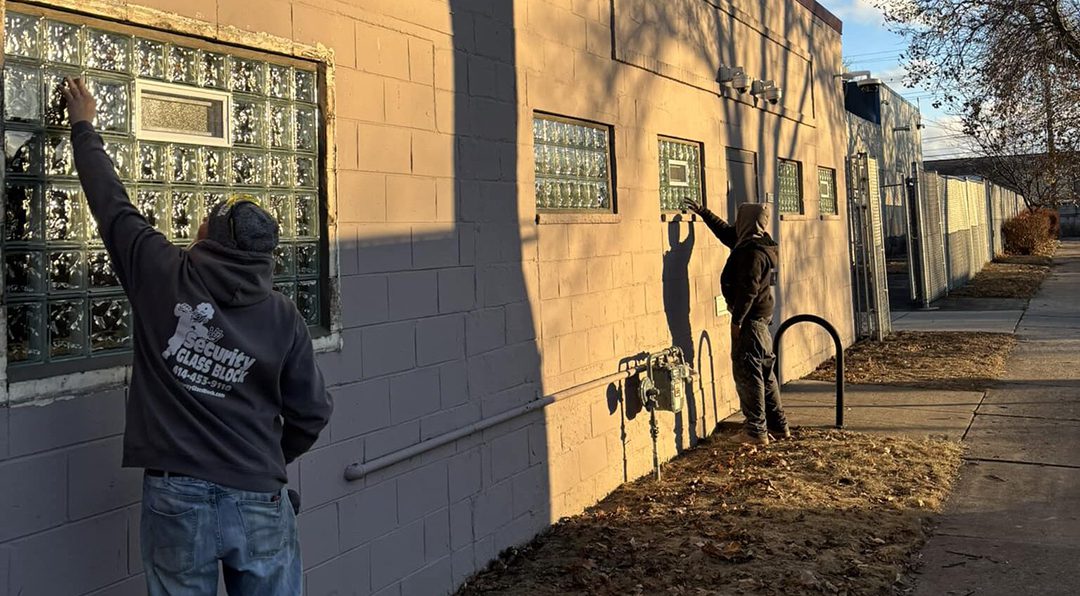 Security Glass Block team installing some windows